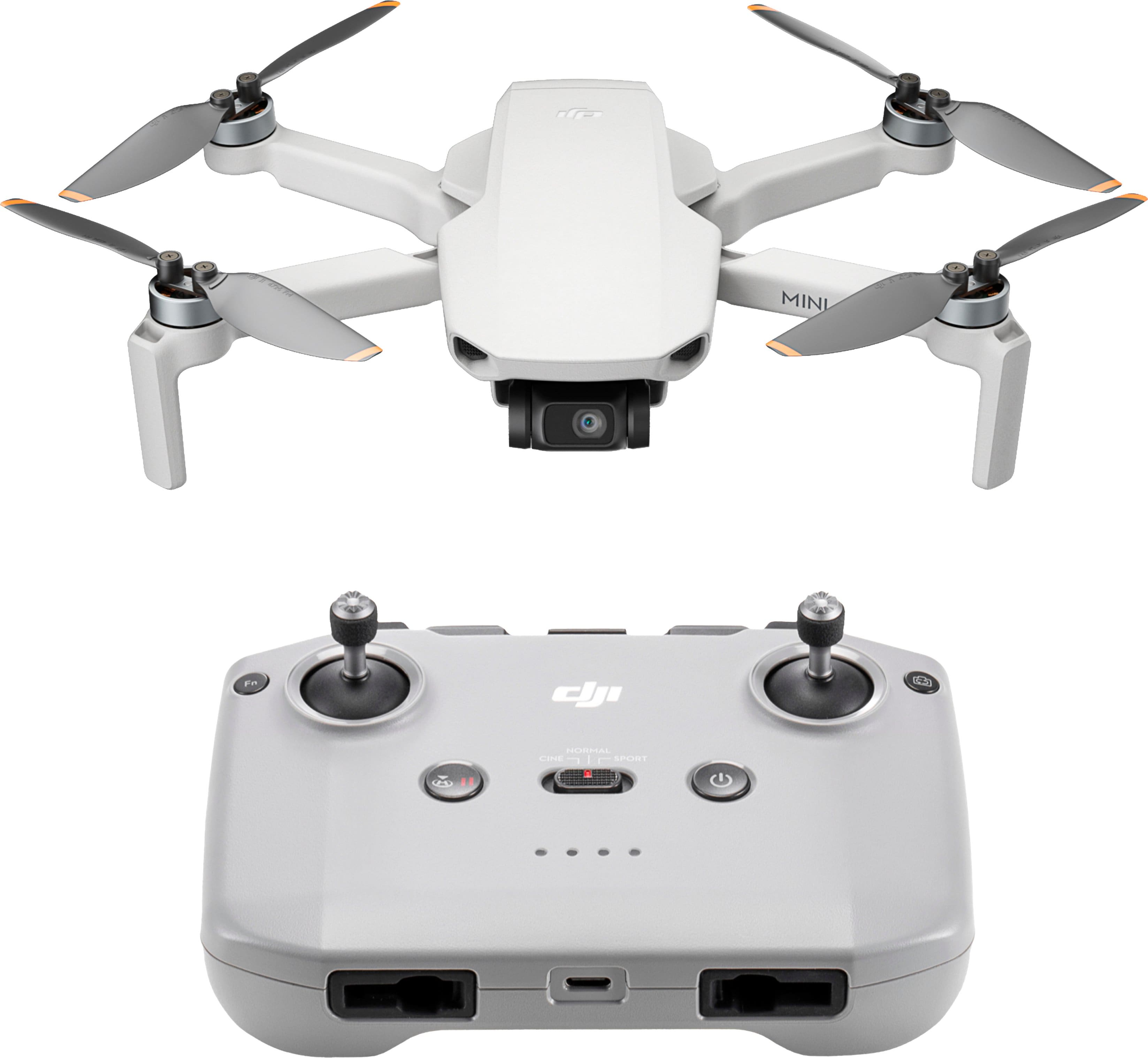 DJI Mini 4K Drone in gray with remote control on a grassy field